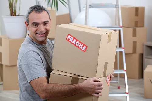 Careful loading of furniture for a home move in South West London