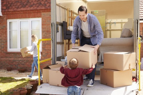 Packed boxes and furniture ready for storage